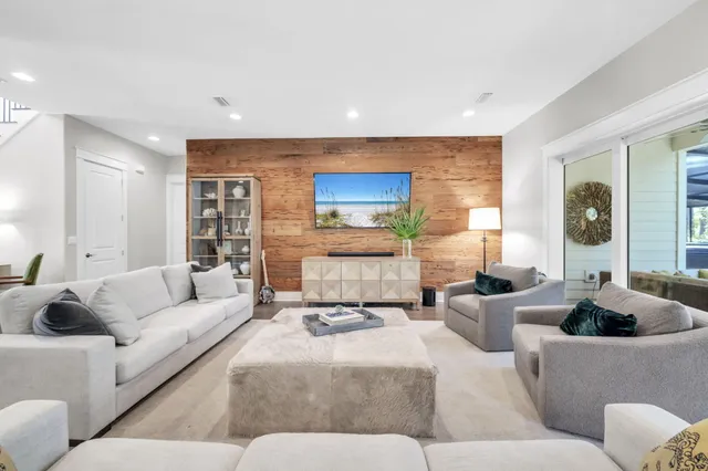 a living room with large windows