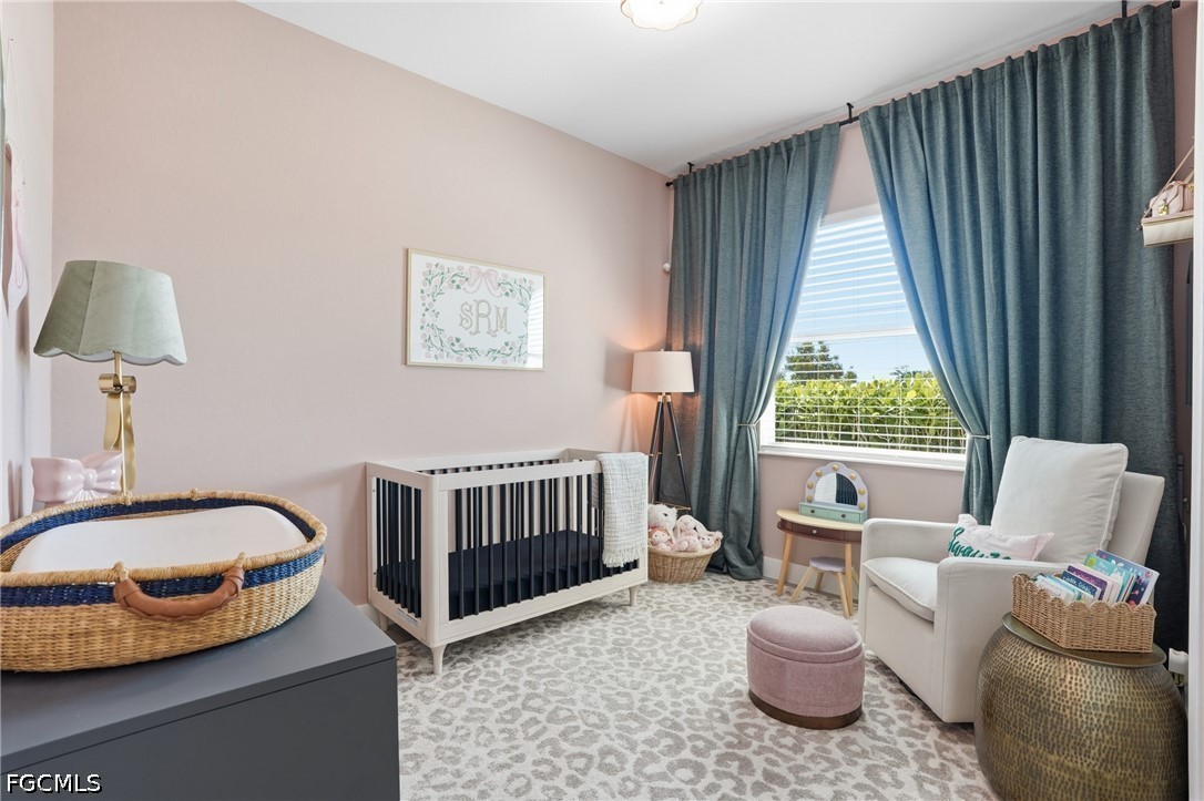 4635 Northwest 32nd Street Cape Coral, FL 33993 - Photo 14 of 30 a bedroom with furniture and a window