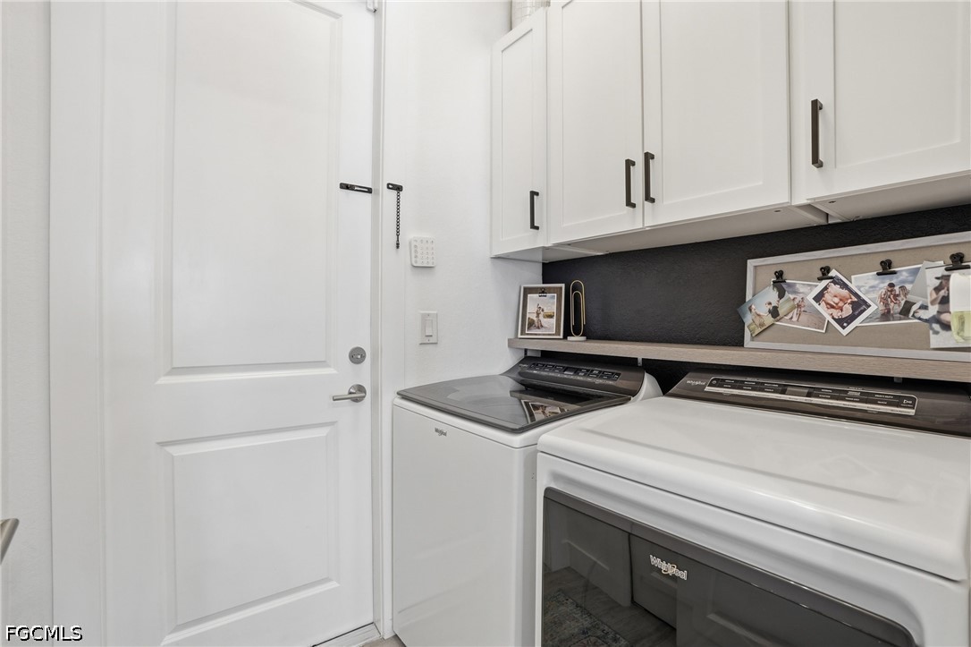 4635 Northwest 32nd Street Cape Coral, FL 33993 - Photo 21 of 30 a utility room with dryer and washer