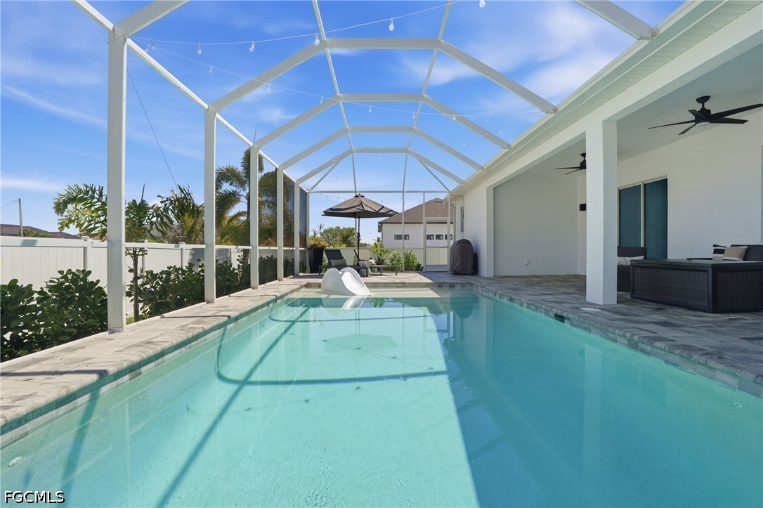 4635 Northwest 32nd Street Cape Coral, FL 33993 - Photo 25 of 30 a view of a swimming pool with a patio