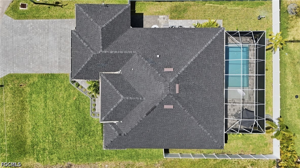 4635 Northwest 32nd Street Cape Coral, FL 33993 - Photo 27 of 30 an aerial view of a house with a yard