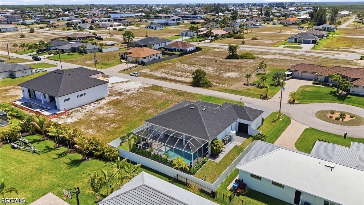 4635 Northwest 32nd Street Cape Coral, FL 33993 - Photo 28 of 30 an aerial view of residential houses with outdoor space