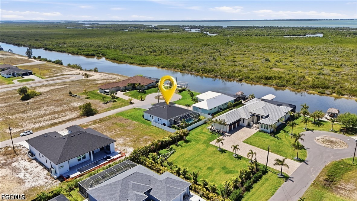 4635 Northwest 32nd Street Cape Coral, FL 33993 - Photo 29 of 30 an aerial view of residential houses with outdoor space