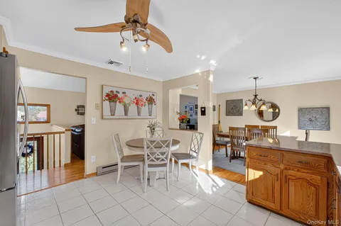 a view of a dining room with furniture