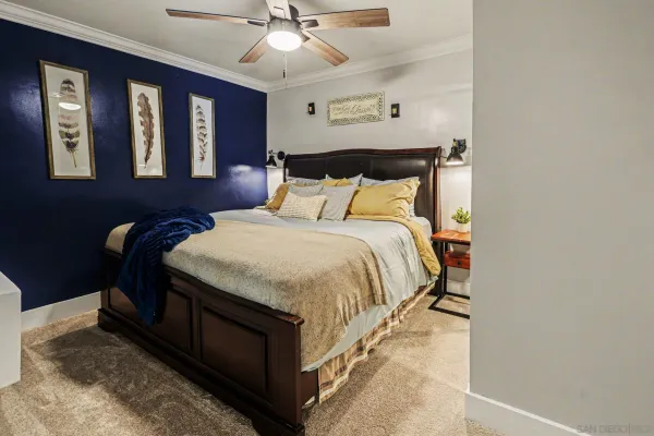 a bedroom with bed and window