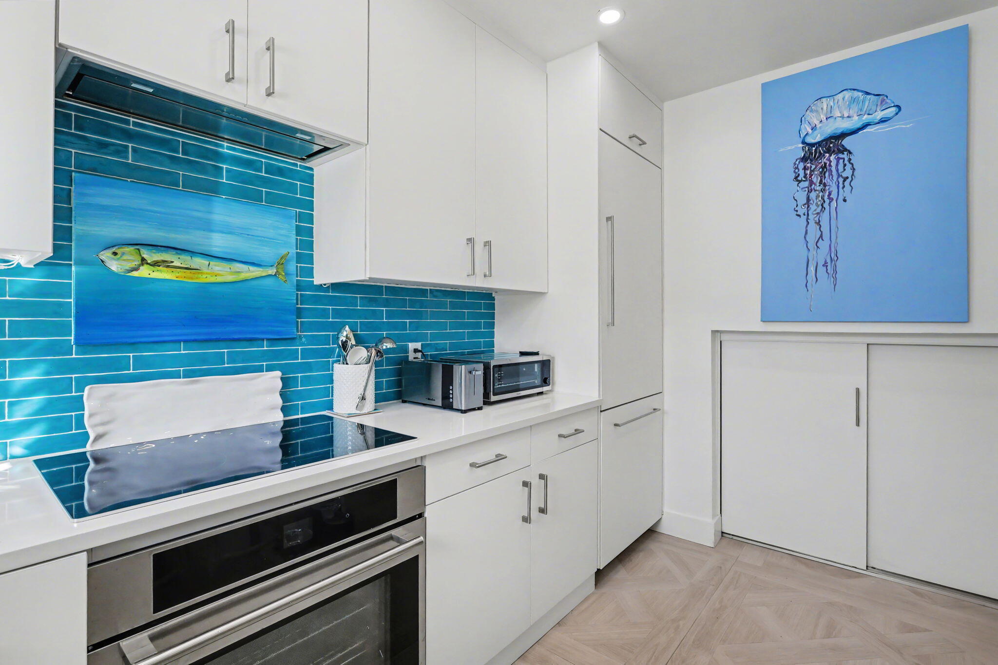 202 Gleason Street, Unit 3 Delray Beach, FL 33483 - Photo 14 of 34 a kitchen with stainless steel appliances a stove and white cabinets