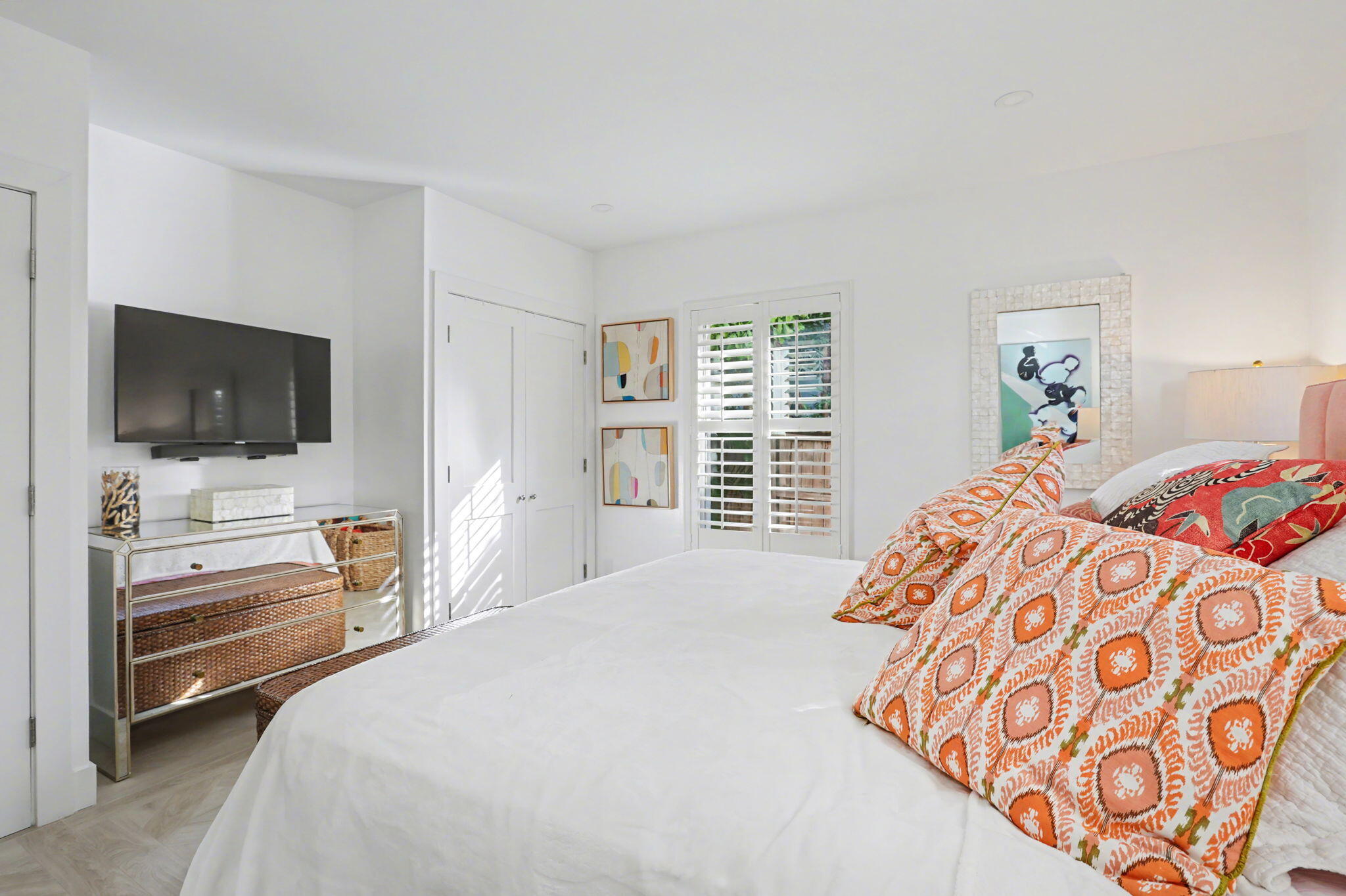 202 Gleason Street, Unit 3 Delray Beach, FL 33483 - Photo 16 of 34 a bedroom with a bed and a flat screen tv