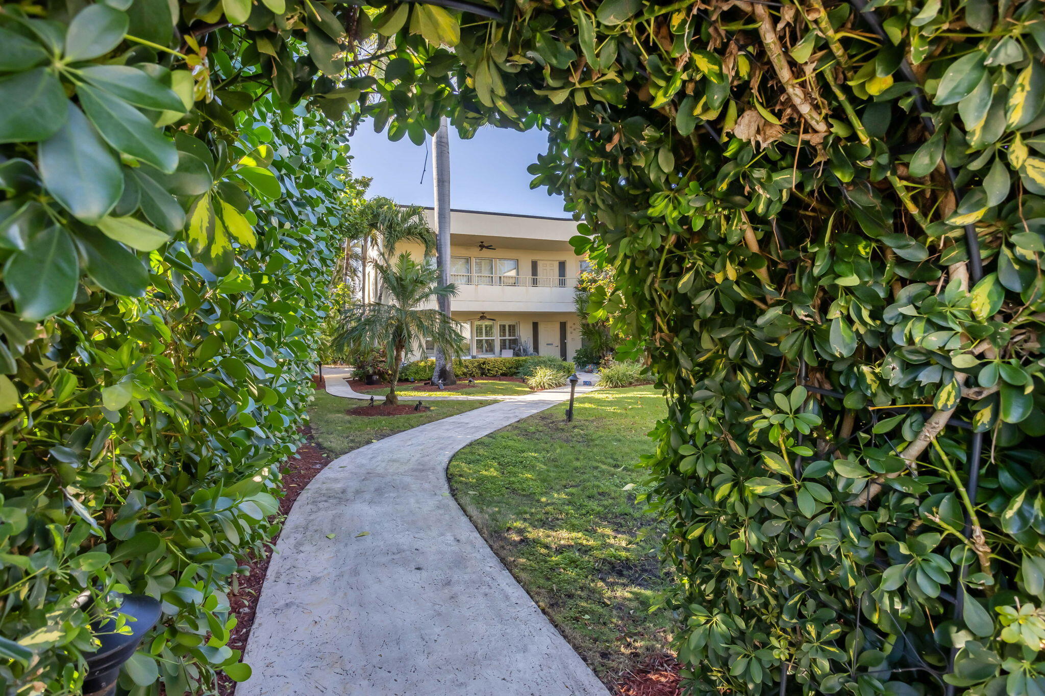202 Gleason Street, Unit 3 Delray Beach, FL 33483 - Photo 23 of 34 a view of a house with a yard