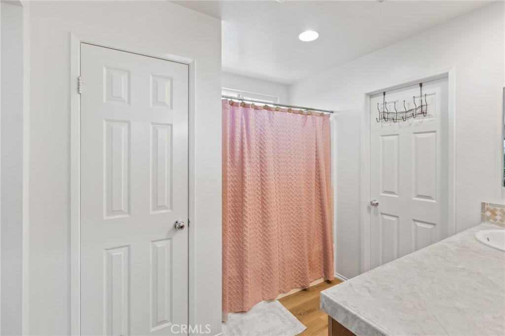 641 Amaranta Avenue Perris, CA 92571 - Photo 17 of 31 a view of a bedroom with door