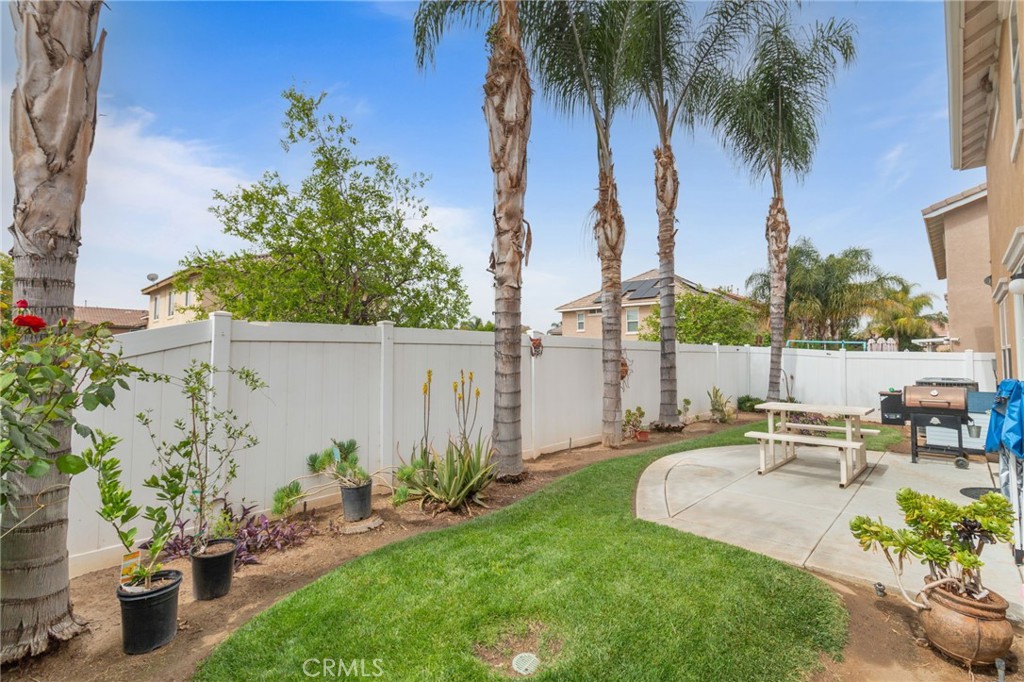 641 Amaranta Avenue Perris, CA 92571 - Photo 27 of 31 a garden view with a seating space