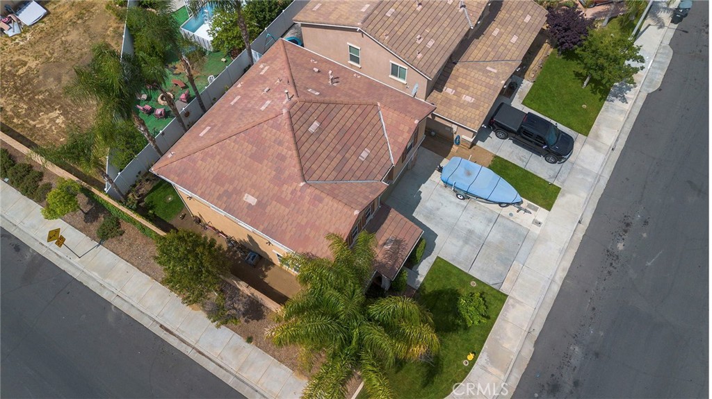 641 Amaranta Avenue Perris, CA 92571 - Photo 30 of 31 an aerial view of a house with a yard