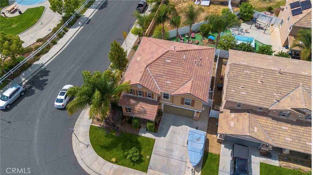 641 Amaranta Avenue Perris, CA 92571 - Photo 31 of 31 an aerial view of a house with garden space and lake view