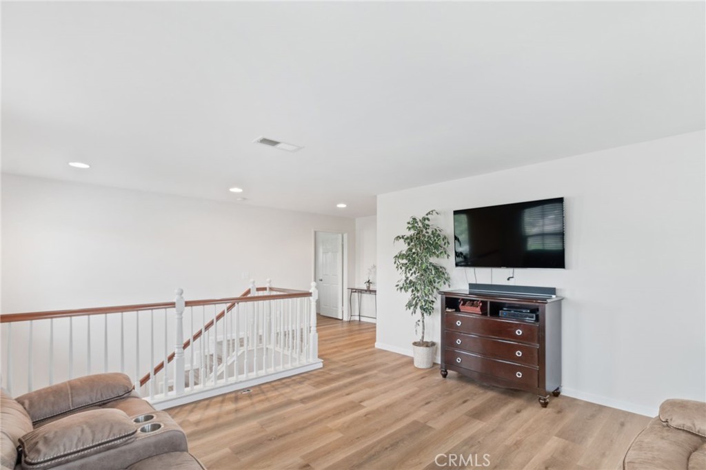 641 Amaranta Avenue Perris, CA 92571 - Photo 10 of 31 a view of livingroom with furniture and flat screen tv