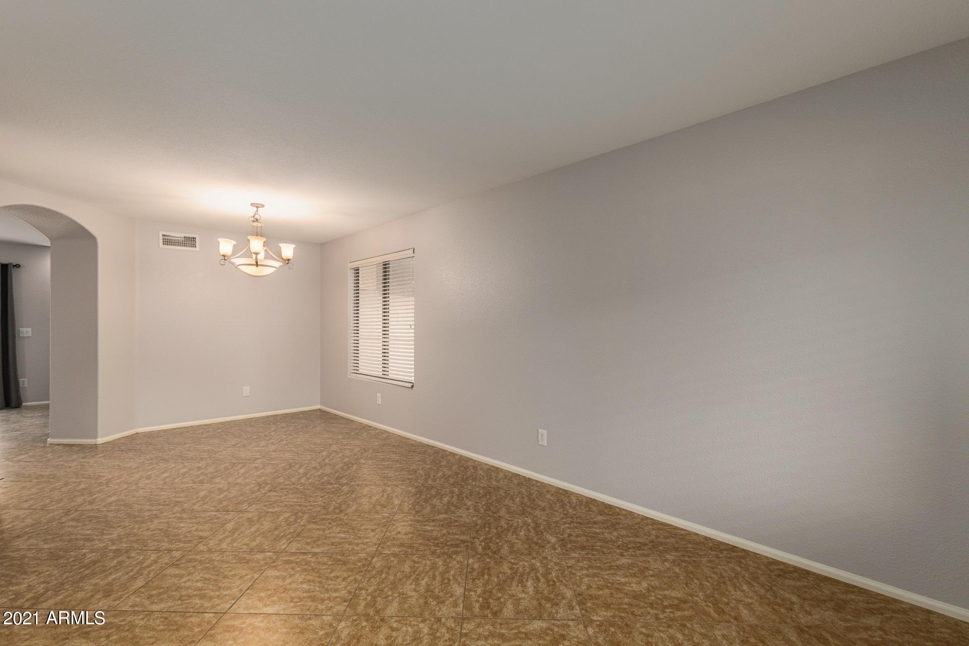 2438 West Running Deer Trail Phoenix, AZ 85085 - Photo 5 of 28 a view of an empty room
