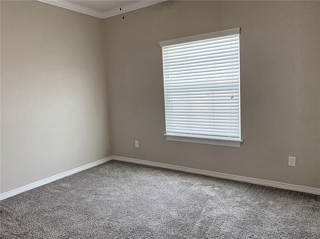 301 Southwest Parkway, Unit 351 College Station, TX 77840 - Photo 6 of 10 an empty room with a window