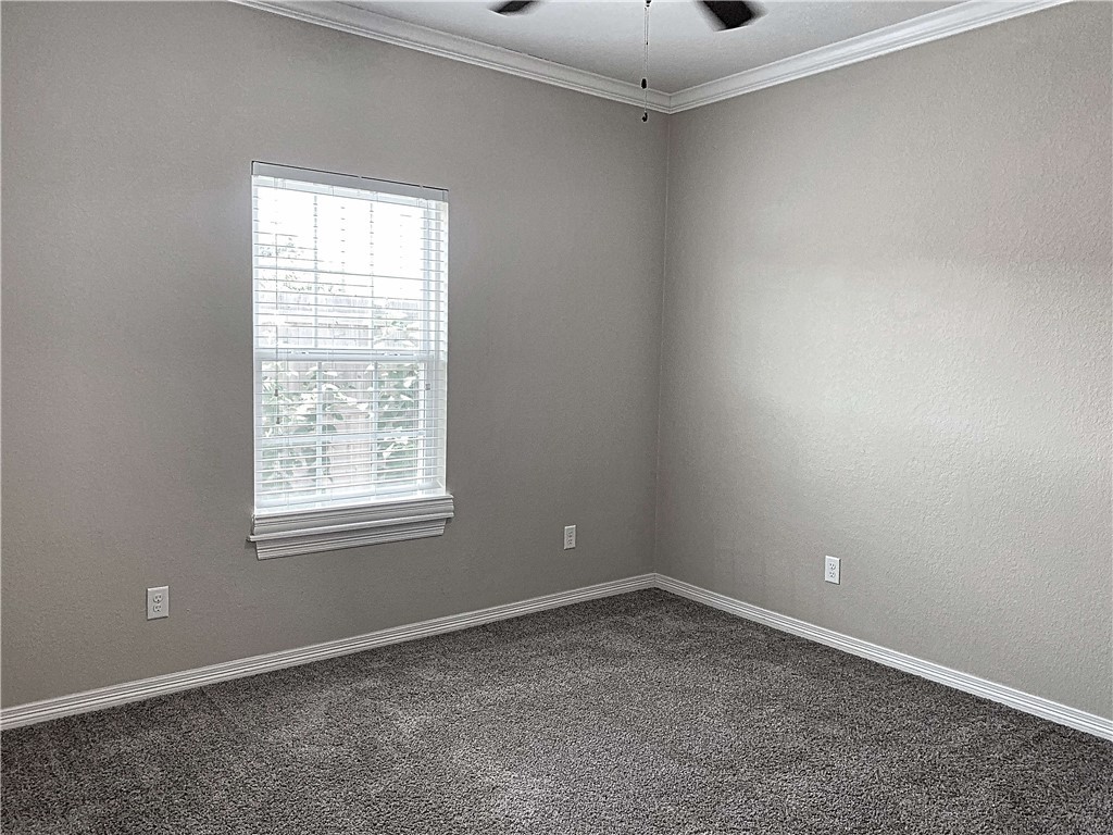 301 Southwest Parkway, Unit 351 College Station, TX 77840 - Photo 8 of 10 an empty room with a window