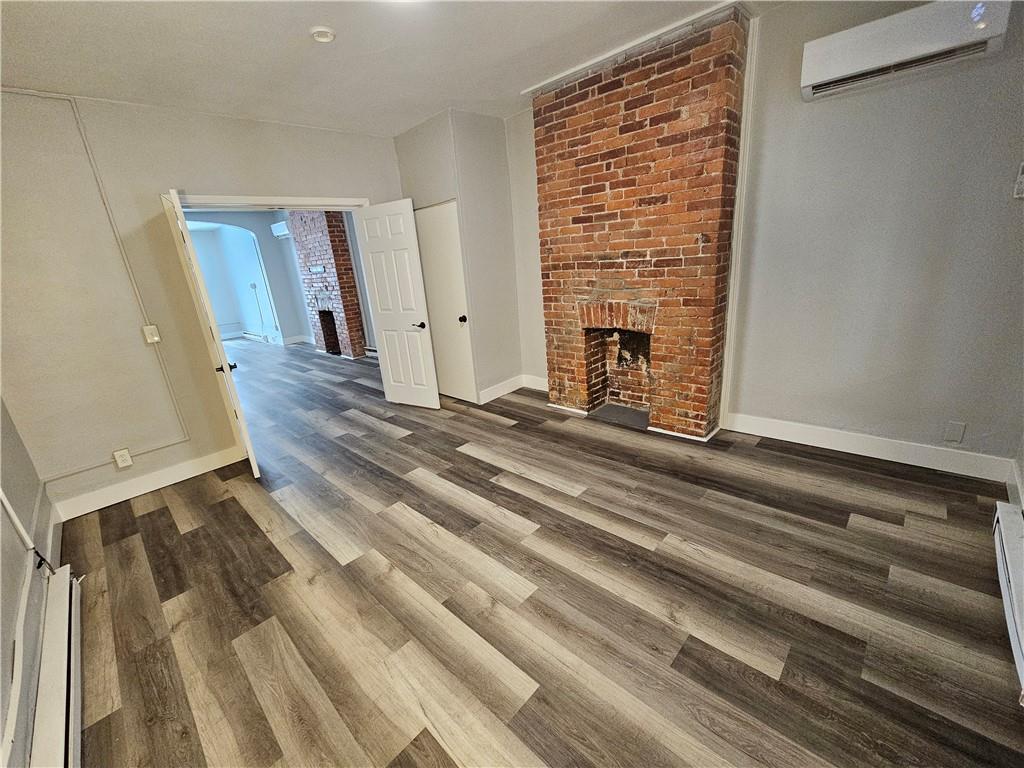 1813 Termon Avenue Pittsburgh, PA 15212 - Photo 9 of 42 Unit 1 Main bedroom located off of the living room- to the right when you enter the unit.