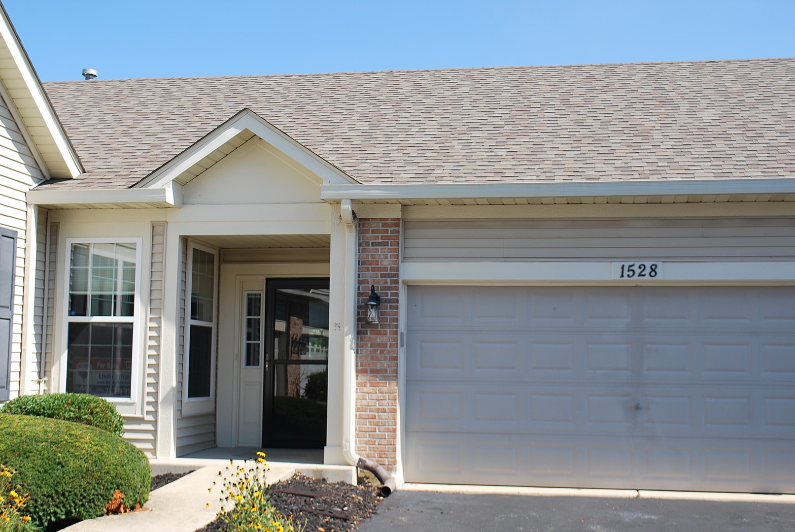 1528 Ludington Circle Romeoville, IL 60446 - Photo 1 of 22 a front view of a house with a porch