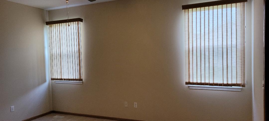 1528 Ludington Circle Romeoville, IL 60446 - Photo 13 of 22 an empty room with windows