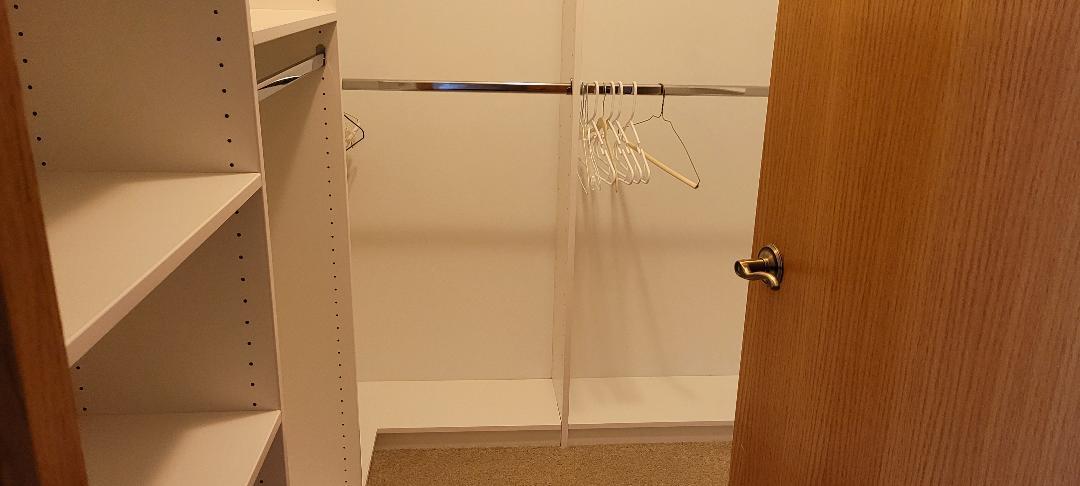 1528 Ludington Circle Romeoville, IL 60446 - Photo 10 of 22 a bathroom with a glass shower door