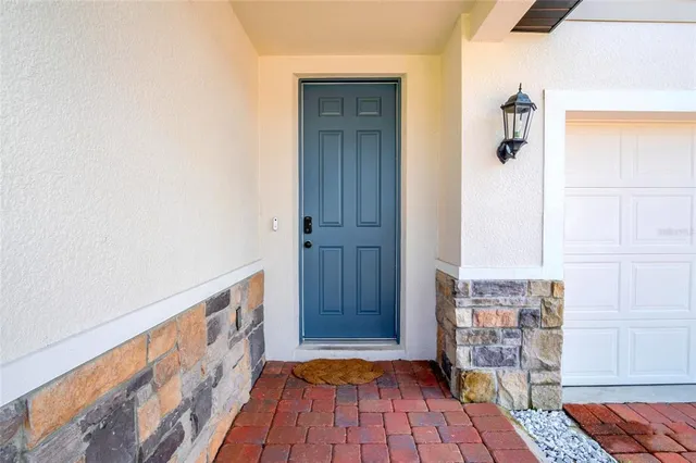 a view of front door with wooden floor