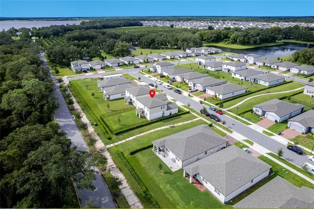 an aerial view of a house with a garden