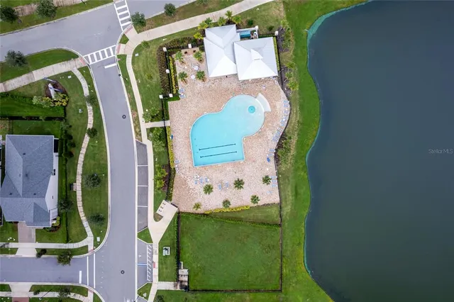 an aerial view of a swimming pool
