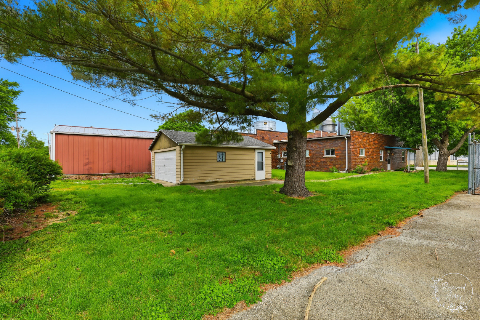 409 Main Street Crescent City, IL 60928 - Photo 20 of 22 a front view of a house with garden