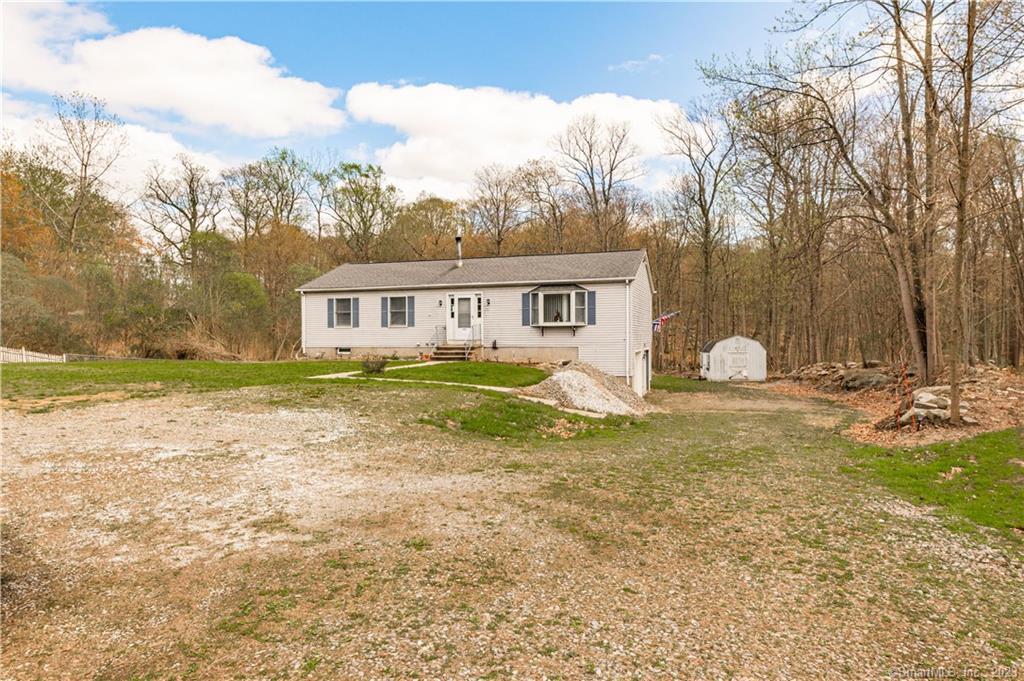 1050 Summit Road Cheshire, CT 06410 - Photo 1 of 1 a swimming pool with outdoor seating and yard