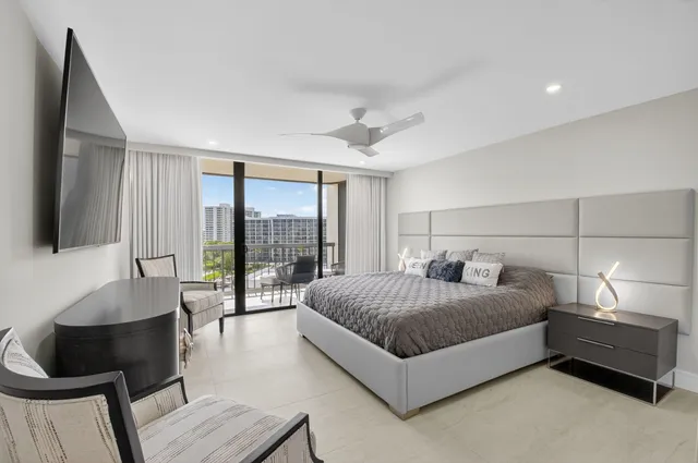 a view of walk in closet with clothes