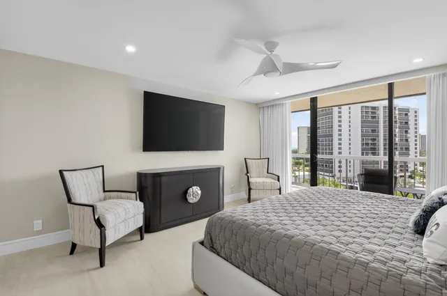 a bathroom with a double vanity sink mirror and toilet