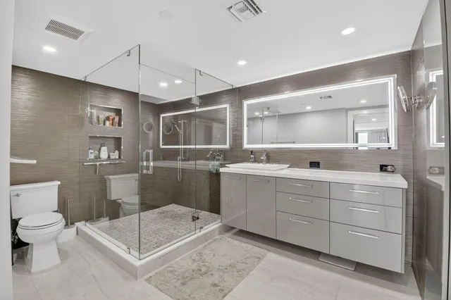 a utility room with sink dryer and washer