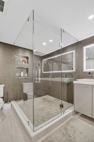 a view of a house with a yard and potted plants