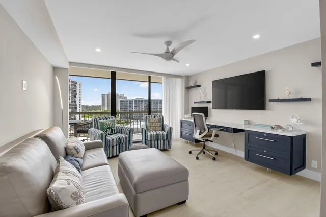 a view of building with yard and entertaining space