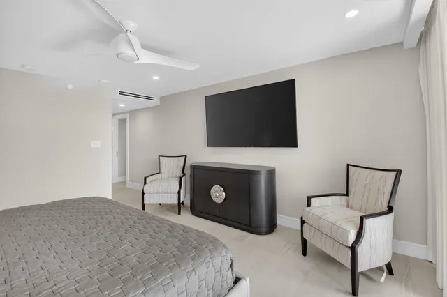 a view of a lake with a palm tree