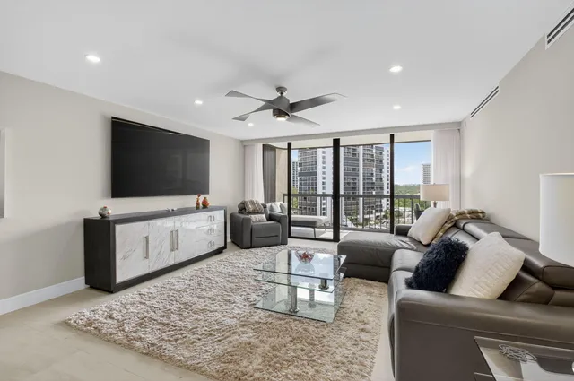 a kitchen with stainless steel appliances a refrigerator sink and cabinets
