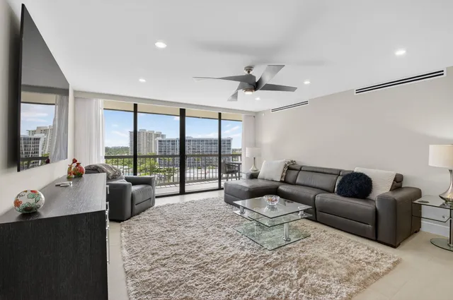 a kitchen with counter top space sink and stainless steel appliances
