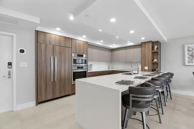 a living room with a bed and a couch