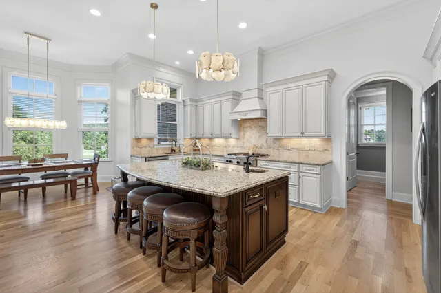 a living room with furniture fireplace and flat screen tv