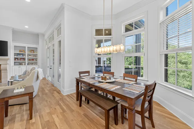 a bathroom with a granite countertop sink mirror vanity and toilet