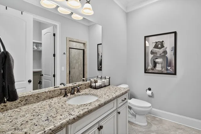 a bedroom with bed and window