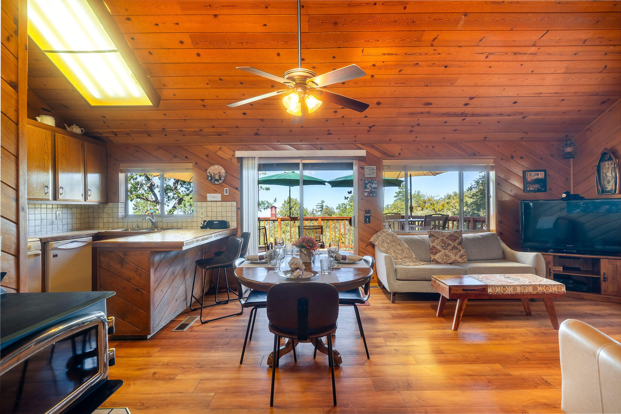 24675 Rocky Point Road Idyllwild, CA 92549 - Photo 3 of 64 a living room with fireplace furniture and a large window