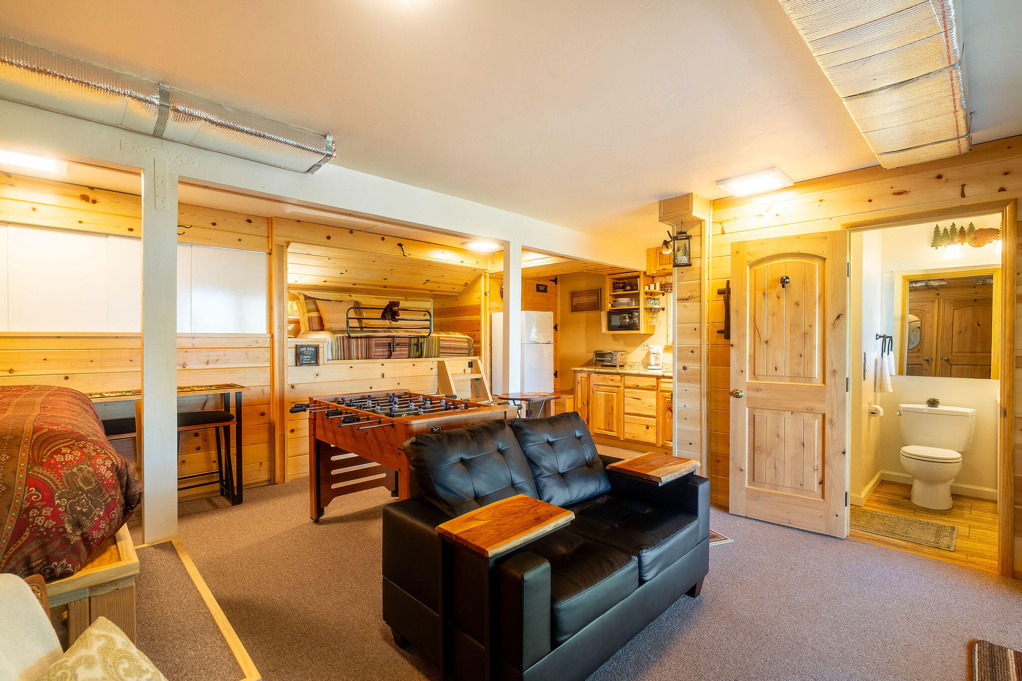 24675 Rocky Point Road Idyllwild, CA 92549 - Photo 34 of 64 a living room with furniture and large windows