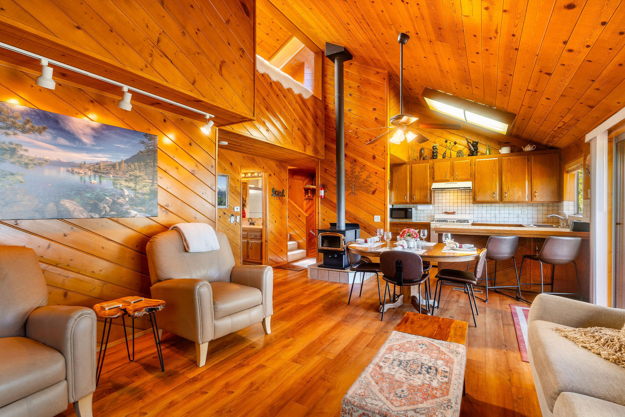 24675 Rocky Point Road Idyllwild, CA 92549 - Photo 9 of 64 a outdoor space with lots of chairs and wooden floor