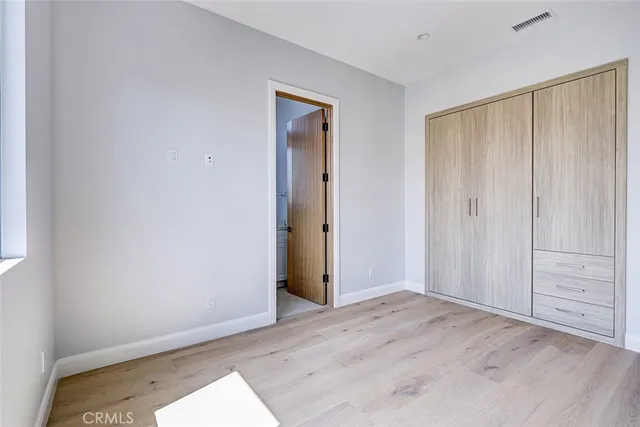 an empty room with closet