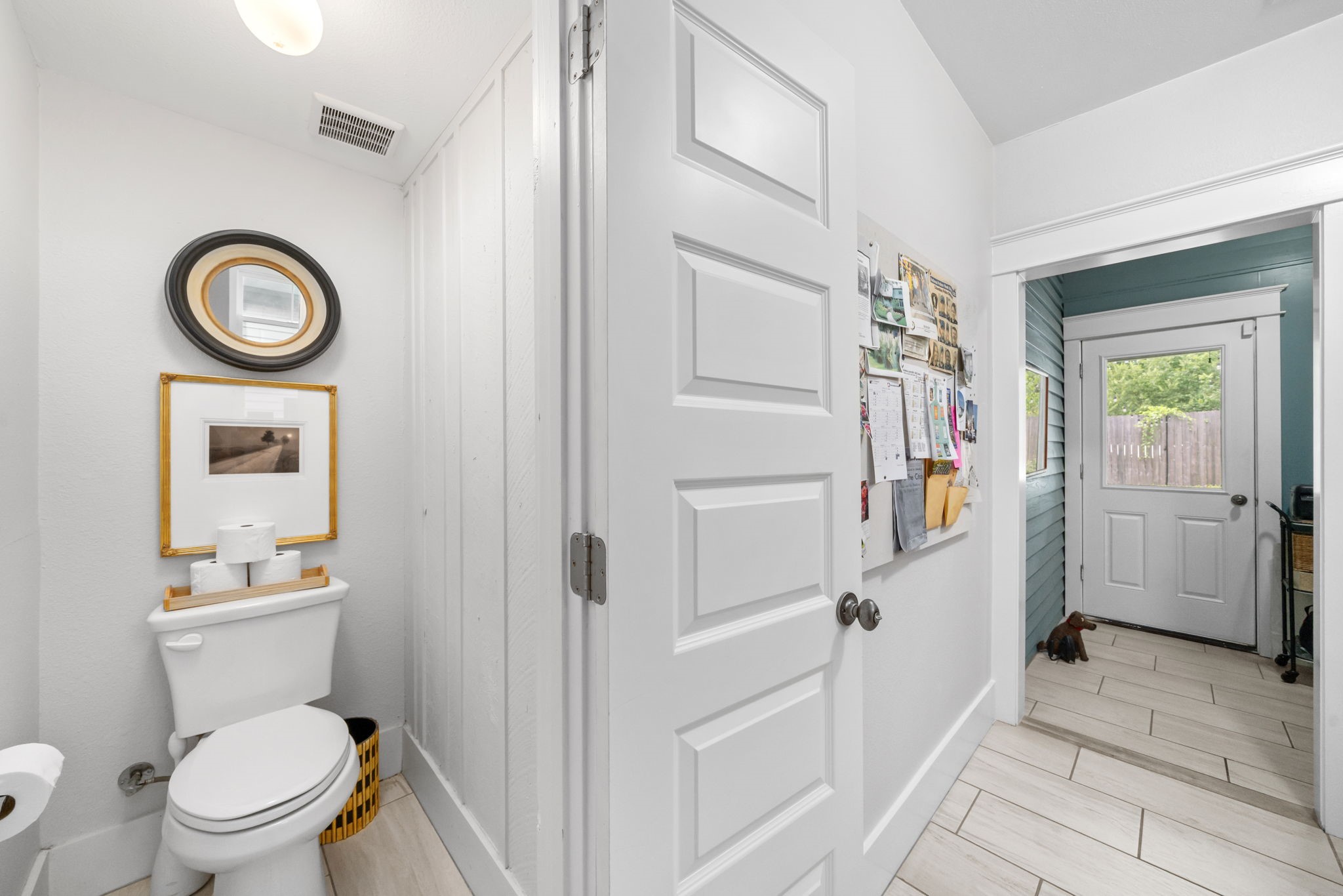 722 Jackson Street Columbus, TX 78934 - Photo 22 of 45 a white toilet sitting next to a bathroom sink