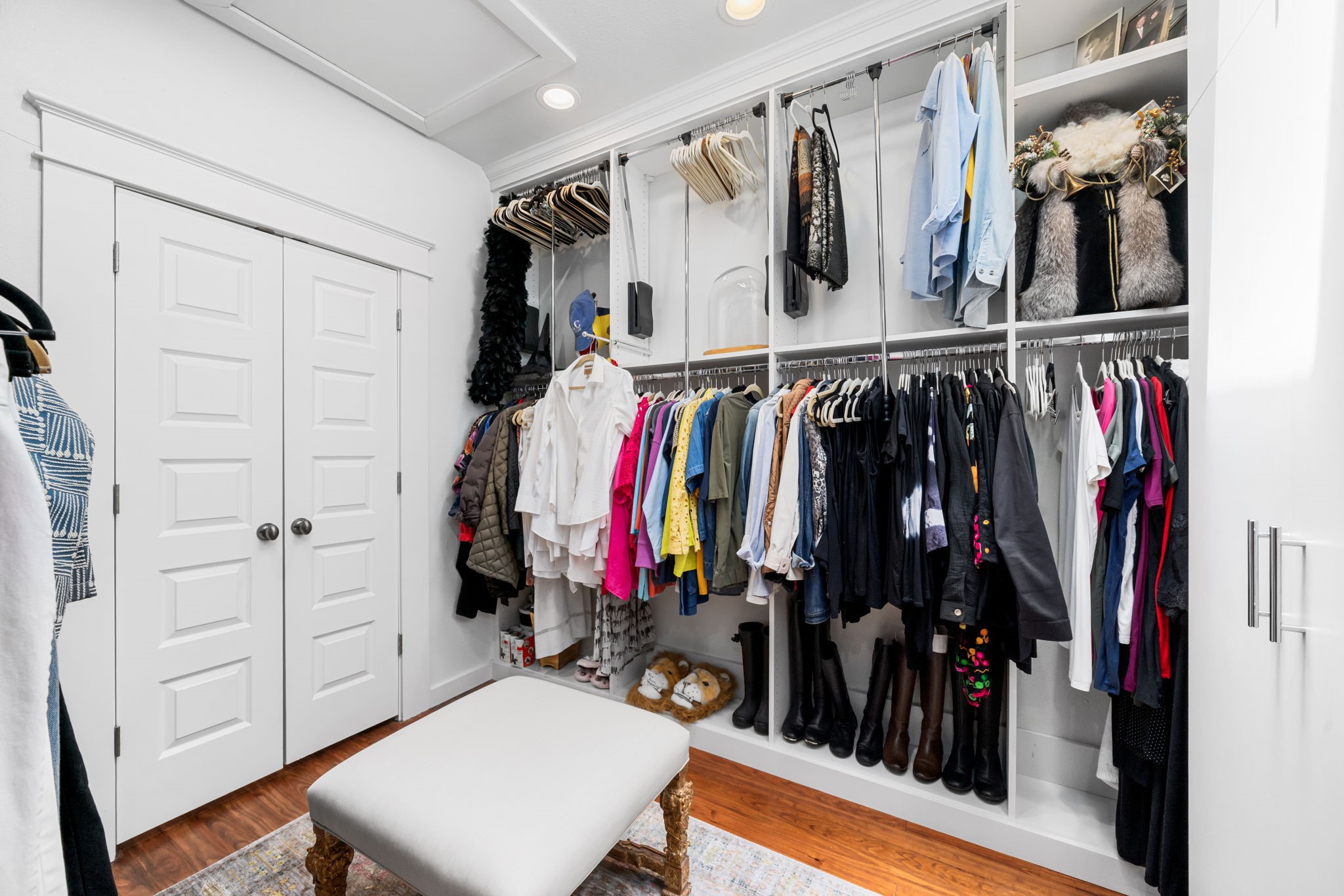 722 Jackson Street Columbus, TX 78934 - Photo 34 of 45 a view of walk in closet with clothes and shoes
