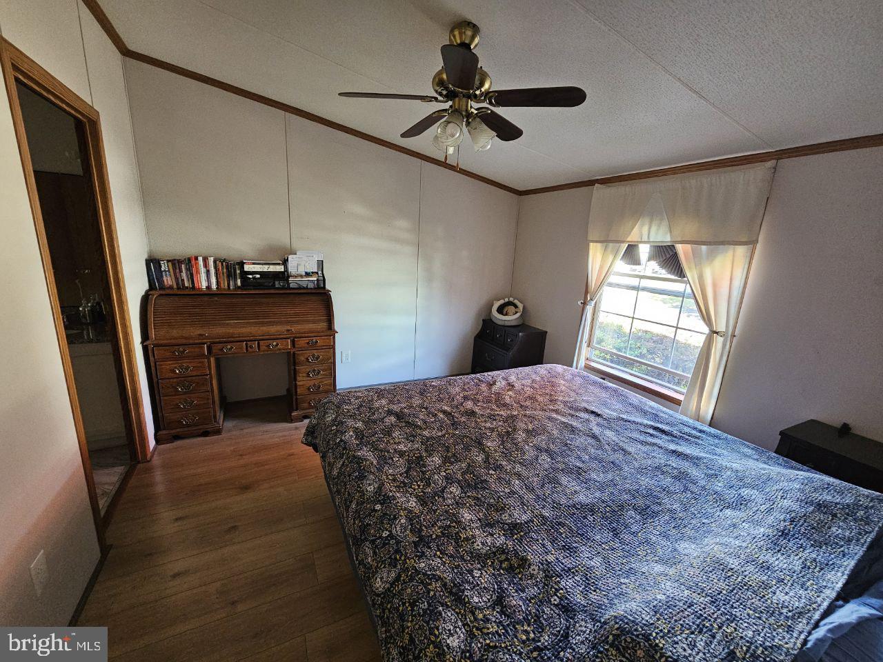 2304 Brownsville Road, Unit L22 Feasterville-Trevose, PA 19053 - Photo 16 of 22 a bedroom with a bed and a window