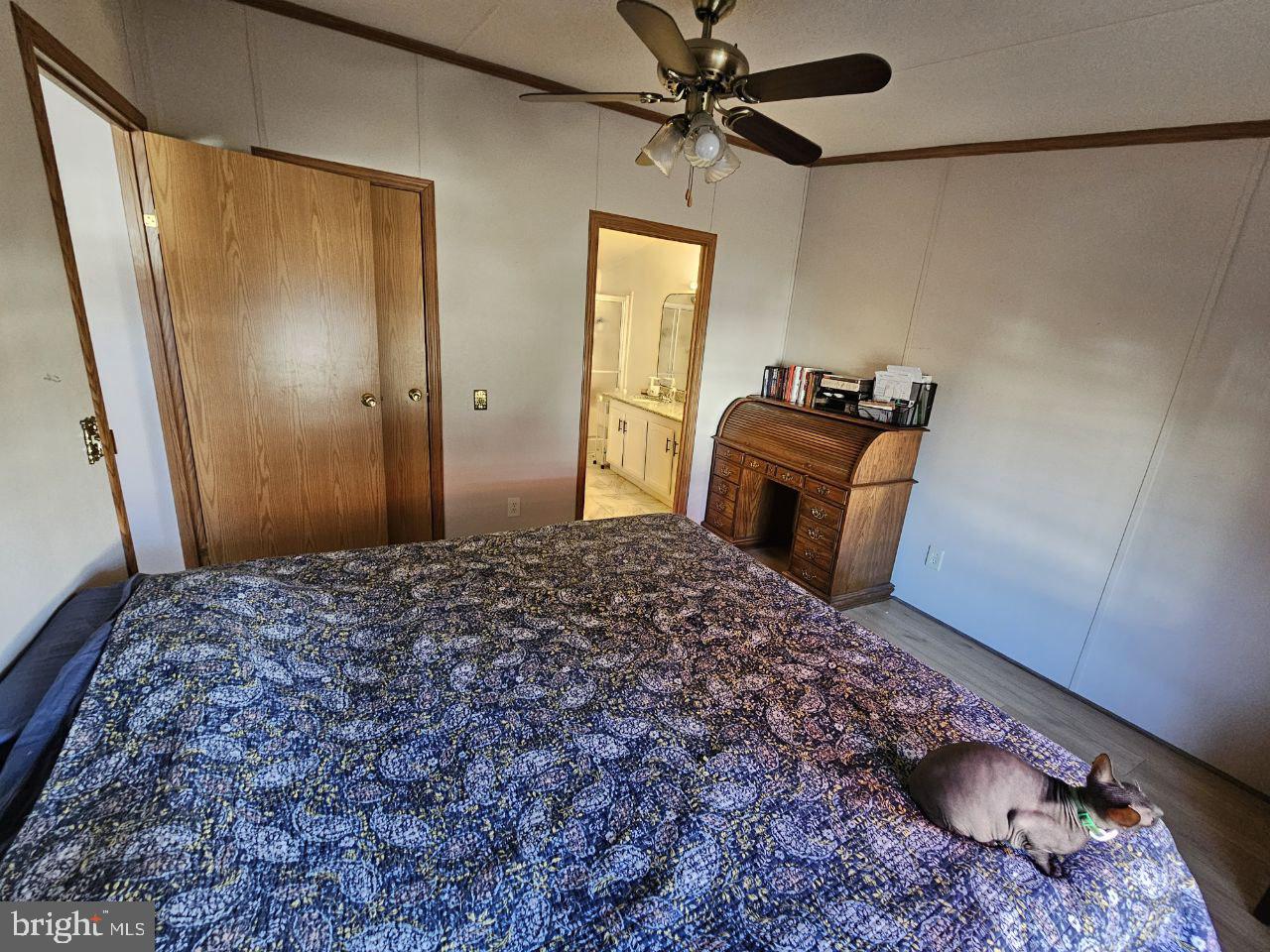 2304 Brownsville Road, Unit L22 Feasterville-Trevose, PA 19053 - Photo 17 of 22 a bedroom with a bed and a mirror