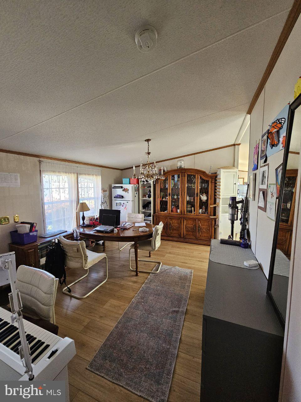 2304 Brownsville Road, Unit L22 Feasterville-Trevose, PA 19053 - Photo 9 of 22 a living room with furniture and wooden floor